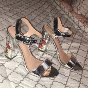 Embroidered silver heels